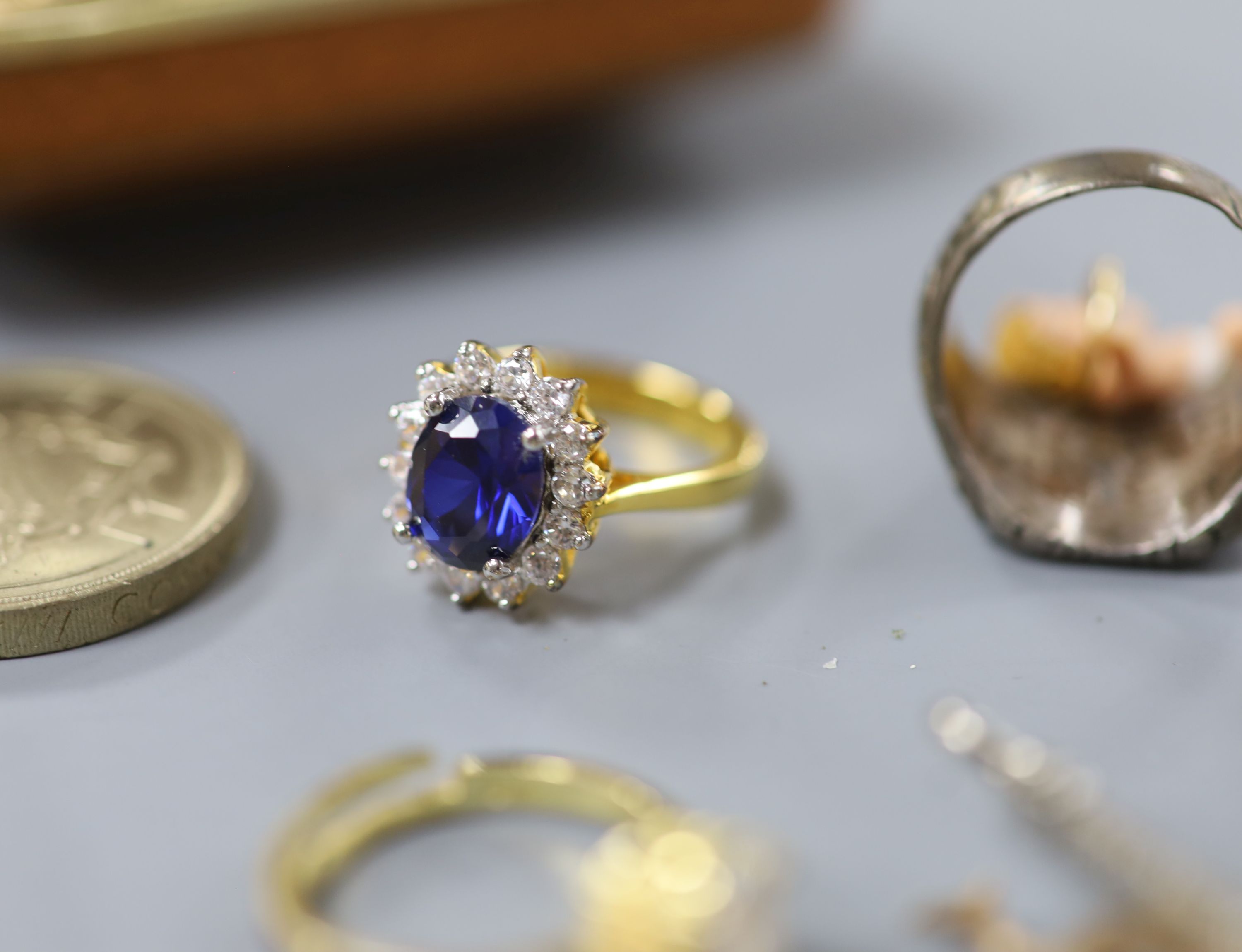 A 9ct and paste set ring, a 9ct gold aeroplane stud, 10kt cross pendant necklace and a quantity of other jewellery, watch, coins etc. including costume.